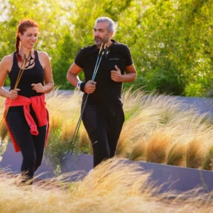 Sporty couple practice Intuitive Running together