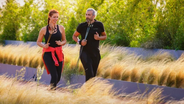 Sporty couple practice Intuitive Running together